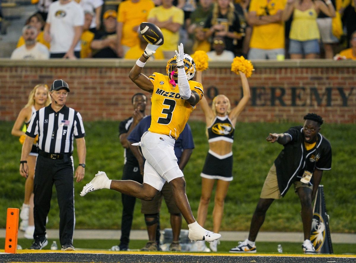 Sep 21, 2024; Columbia, Missouri, USA; Missouri Tigers wide receiver Luther Burden III (3) catches a touchdown pass during overtime against the Vanderbilt Commodores at Faurot Field at Memorial Stadium. Mandatory Credit: Jay Biggerstaff-Imagn Images