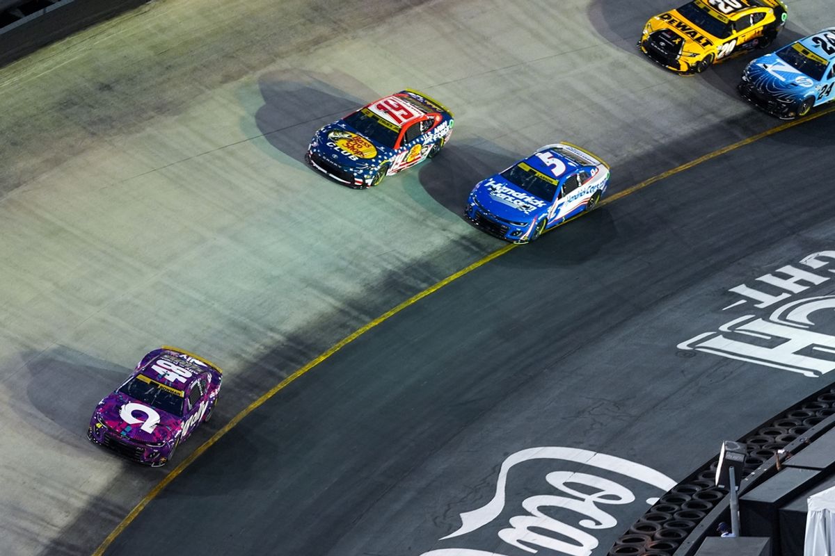 Sep 21, 2024; Bristol, Tennessee, USA; NASCAR Cup Series driver Alex Bowman (48) leads driver Kyle Larson (5) and driver Martin Truex Jr. (19) into turn 4 during the Bass Pro Shops Night Race at Bristol Motor Speedway. Mandatory Credit: Randy Sartin-Imagn Images