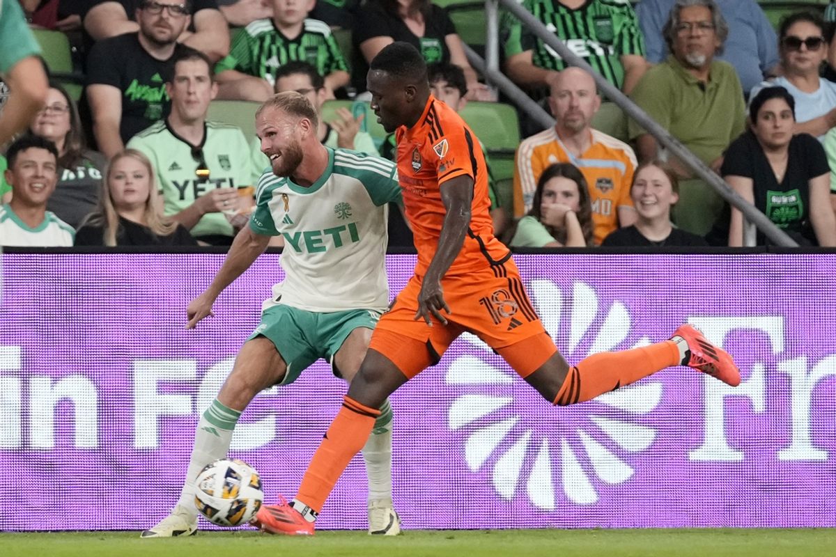 Sep 21, 2024; Austin, Texas, USA; Austin FC defender Mikkel Desler (3) and Houston Dynamo FC forward Ibrahim Aliyu (18) battle for the ball in the first half at Q2 Stadium. Mandatory Credit: Scott Wachter-Imagn Images