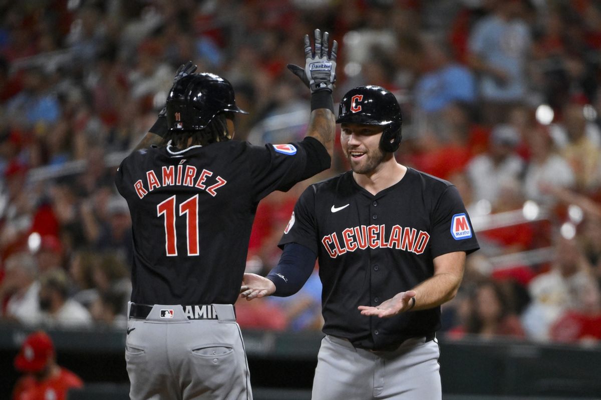 Sep 21, 2024; St. Louis, Missouri, USA;  Cleveland Guardians third baseman Jose Ramirez (11) celebrates with pinch hitter David Fry (6) after hitting a three run home run against the St. Louis Cardinals during the eighth inning at Busch Stadium. Mandatory Credit: Jeff Curry-Imagn Images