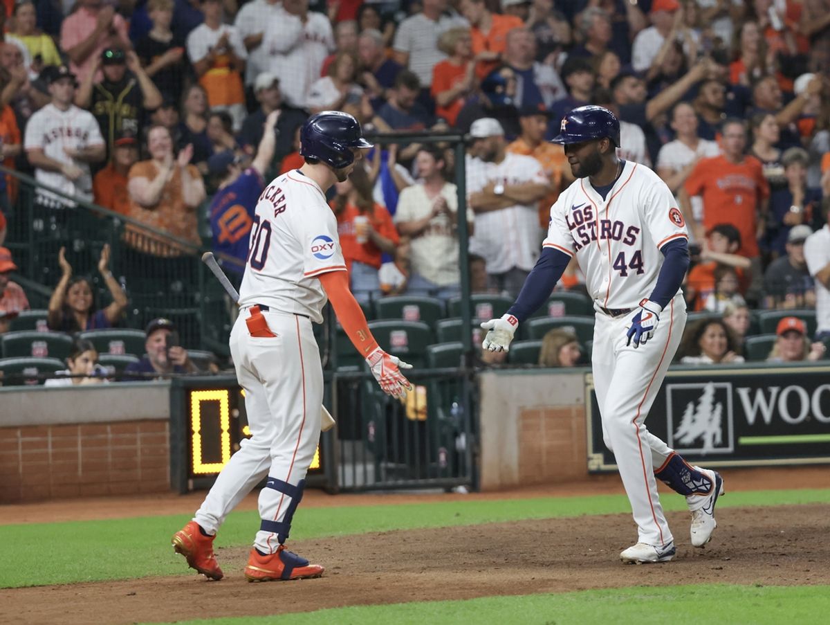 Sep 21, 2024; Houston, Texas, USA; Houston Astros designated hitter Yordan Alvarez (44) rounds the bases after hitting a home run and celebrates with right fielder Kyle Tucker (30) against the Los Angeles Angels in the seventh inning at Minute Maid Park. Mandatory Credit: Thomas Shea-Imagn Images