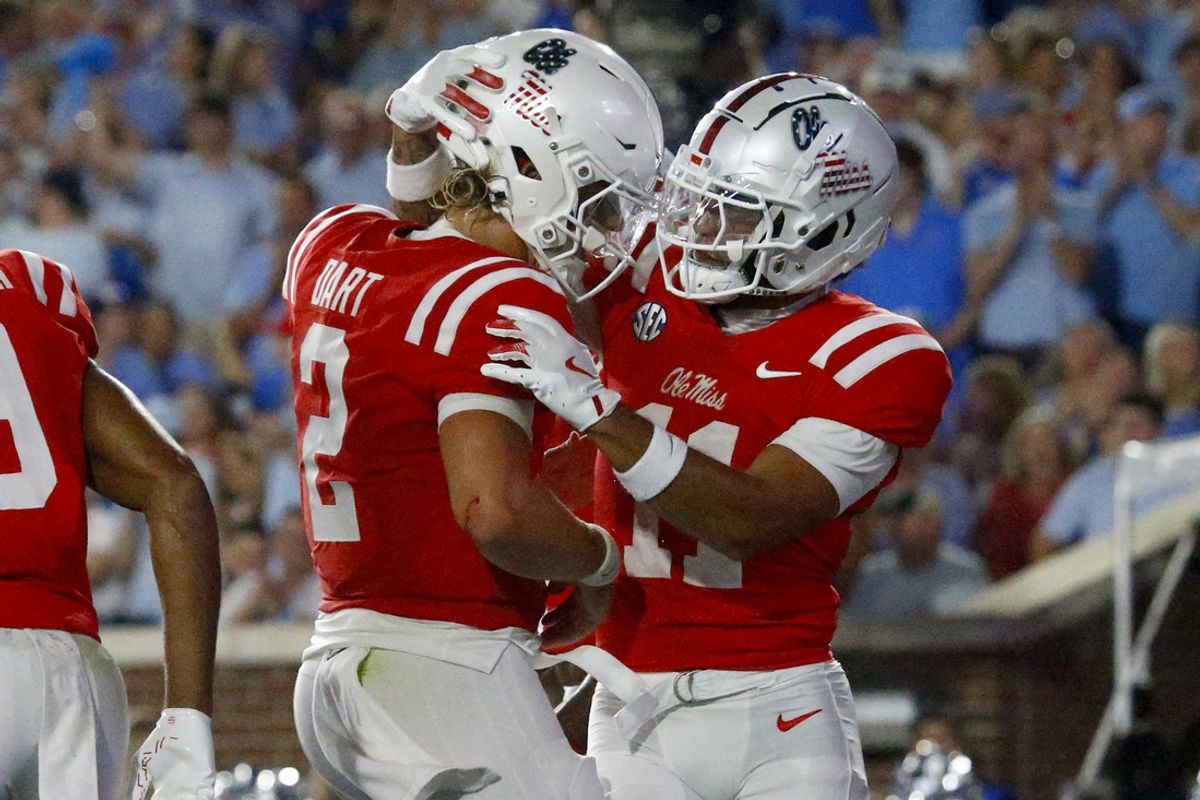 Sep 21, 2024; Oxford, Mississippi, USA; Mississippi Rebels quarterback Jaxson Dart (2) reacts with wide receiver Jordan Watkins (11) after a touchdown during the first half against the Georgia Southern Eagles at Vaught-Hemingway Stadium. Mandatory Credit: Petre Thomas-Imagn Images