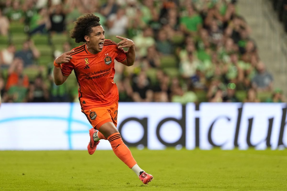 Sep 21, 2024; Austin, Texas, USA; Houston Dynamo FC midfielder Coco Carrasquilla (20) celebrates after scoring a goal against Austin FC in the second half at Q2 Stadium. Mandatory Credit: Scott Wachter-Imagn Images