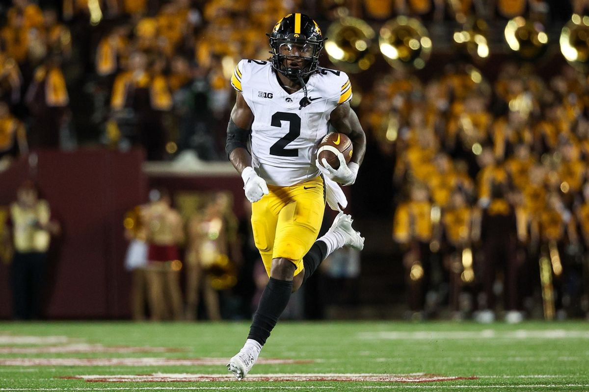 Sep 21, 2024; Minneapolis, Minnesota, USA; Iowa Hawkeyes running back Kaleb Johnson (2) runs the ball against the Minnesota Golden Gophers during the second half at Huntington Bank Stadium. Mandatory Credit: Matt Krohn-Imagn Images