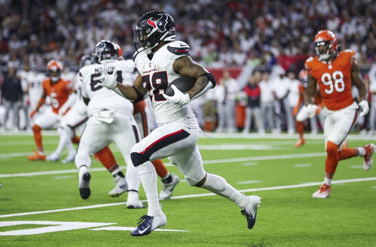 Sep 15, 2024; Houston, Texas, USA; Houston Texans running back Joe Mixon (28) runs with the ball during the third quarter against the Chicago Bears at NRG Stadium. Mandatory Credit: Troy Taormina-Imagn Images