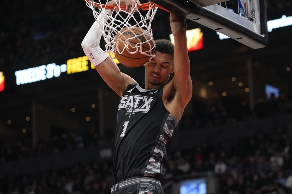 Feb 12, 2024; Toronto, Ontario, CAN; San Antonio Spurs center Victor Wembanyama (1) dunks the ball against the Toronto Raptors during the second half at Scotiabank Arena.