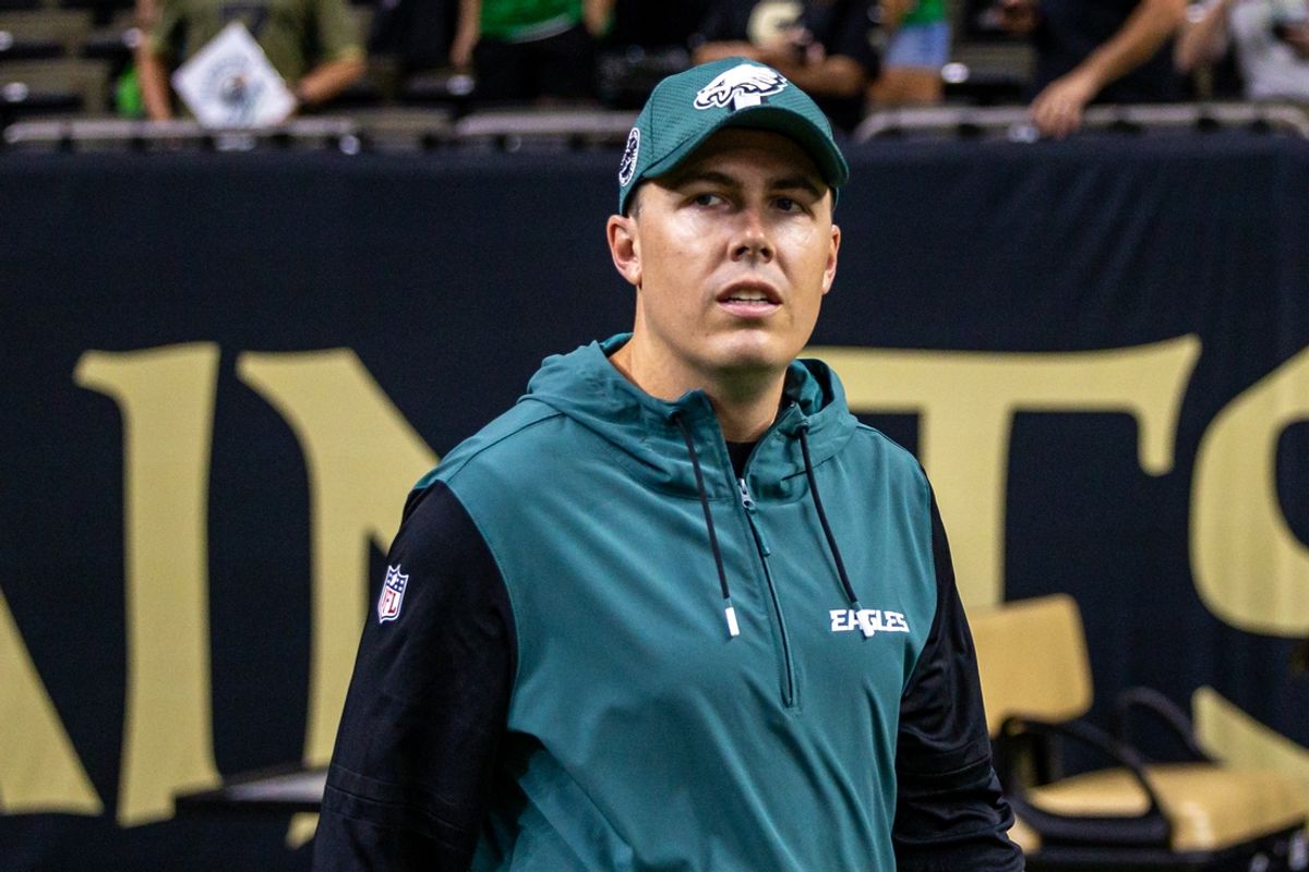 Sep 22, 2024; New Orleans, Louisiana, USA; Philadelphia Eagles offensive coordinator Kellen Moore looks on during warmups before the game against the New Orleans Saints at Caesars Superdome. Mandatory Credit: Stephen Lew-Imagn Images