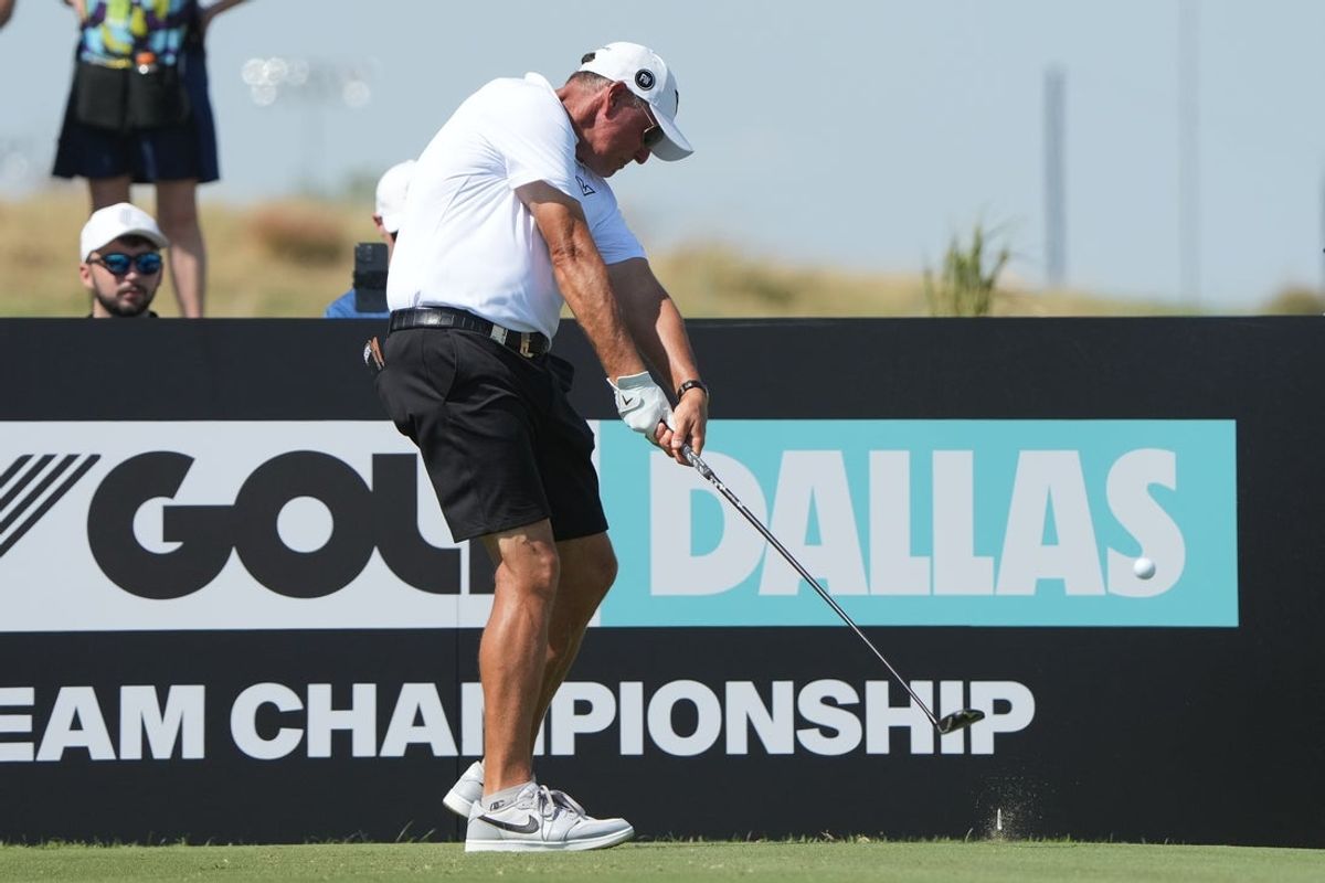Sep 22, 2024; Carrolton, Texas, USA; Phil Mickelson plays his shot from the 16th tee during the LIV Golf Dallas Team Championship Finals at Maridoe Golf Club. Mandatory Credit: Jim Cowsert-Imagn Images