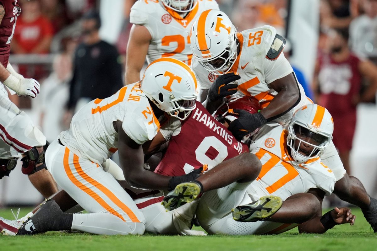 Oklahoma Sooners quarterback Michael Hawkins Jr. (9) is brought down by Tennessee Volunteers defensive lineman James Pearce Jr. (27), defensive lineman Omarr Norman-Lott (55) and defensive lineman Jayson Jenkins (97) during a college football game between the University of Oklahoma Sooners (OU) and the Tennessee Volunteers at Gaylord Family - Oklahoma Memorial Stadium in Norman, Okla., Saturday, Sept. 21, 2024.