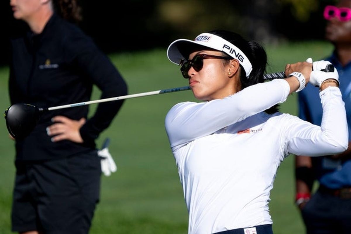Bianca Pagdanganan, of the Philippines, tees off on the first hole during the Kroger Queen City Classic in Cincinnati on Sunday, Sept. 22, 2024.