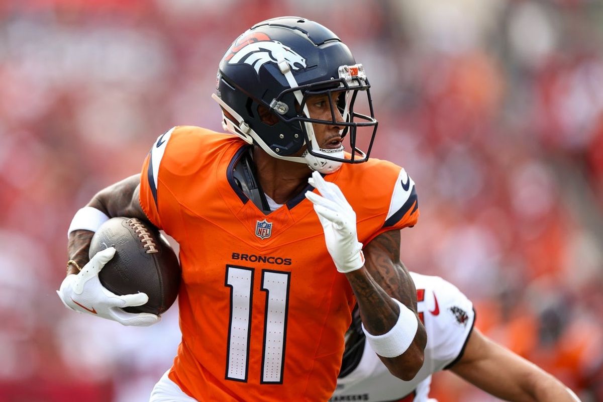 Sep 22, 2024; Tampa, Florida, USA; Denver Broncos wide receiver Josh Reynolds (11) makes a catch against the Tampa Bay Buccaneers in the first quarter at Raymond James Stadium. Mandatory Credit: Nathan Ray Seebeck-Imagn Images