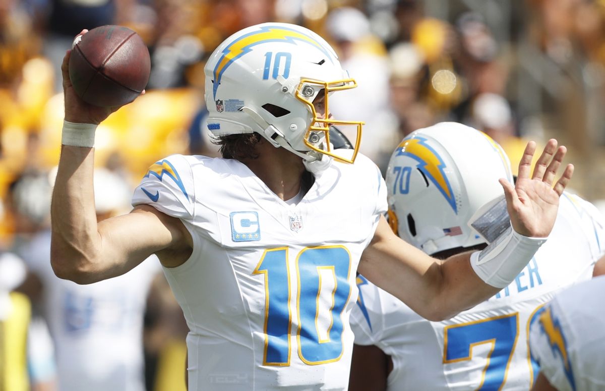 Sep 22, 2024; Pittsburgh, Pennsylvania, USA;  Los Angeles Chargers quarterback Justin Herbert (10) passes the ball against the Los Angeles Chargers during the first quarter at Acrisure Stadium. Mandatory Credit: Charles LeClaire-Imagn Images