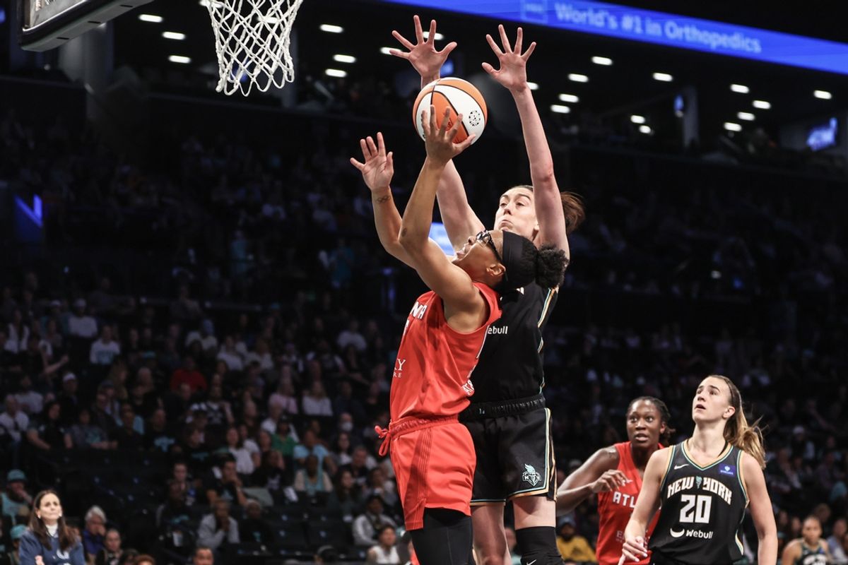 Sep 22, 2024; Brooklyn, New York, USA; Atlanta Dream guard Allisha Gray (15) looks to drive past New York Liberty forward Breanna Stewart (30) during game one of the first round of the 2024 WNBA Playoffs at Barclays Center. Mandatory Credit: Wendell Cruz-Imagn Images