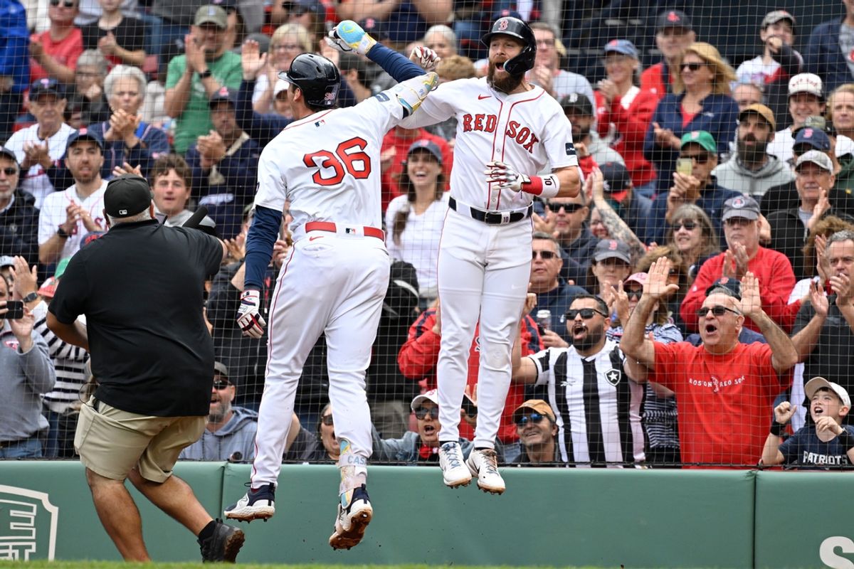 Sep 22, 2024; Boston, Massachusetts, USA;  Boston Red Sox first baseman Triston Casas (36) celebrates his three run home run with shortstop Trevor Story (10) during the third inning against the Minnesota Twins at Fenway Park. Mandatory Credit: Eric Canha-Imagn Images