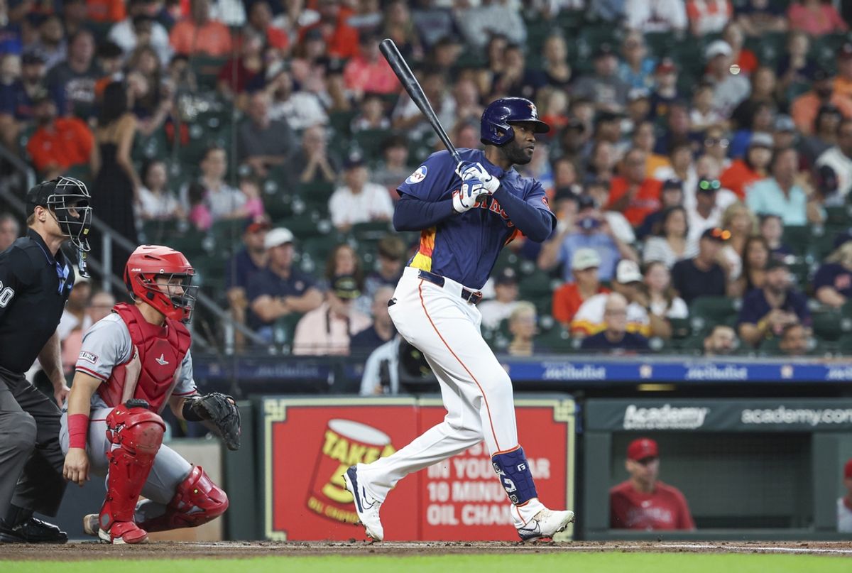 Sep 22, 2024; Houston, Texas, USA; Houston Astros left fielder Yordan Alvarez (44) hits a single during the first inning against the Los Angeles Angels at Minute Maid Park. Mandatory Credit: Troy Taormina-Imagn Images