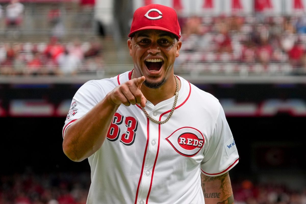Cincinnati Reds pitcher Fernando Cruz (63) celebrates after playing a bunt to end the top of the fourth inning of the MLB National League Game between the Cincinnati Reds and the Pittsburgh Pirates at Great American Ball Park in downtown Cincinnati on Sunday, Sept. 22, 2024. The Pirates led 1-0 after four innings.