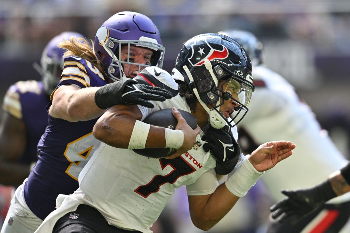 Sep 22, 2024; Minneapolis, Minnesota, USA; Houston Texans quarterback C.J. Stroud (7) is sacked by Minnesota Vikings linebacker Andrew Van Ginkel (43) during the second quarter at U.S. Bank Stadium. Mandatory Credit: Jeffrey Becker-Imagn Images