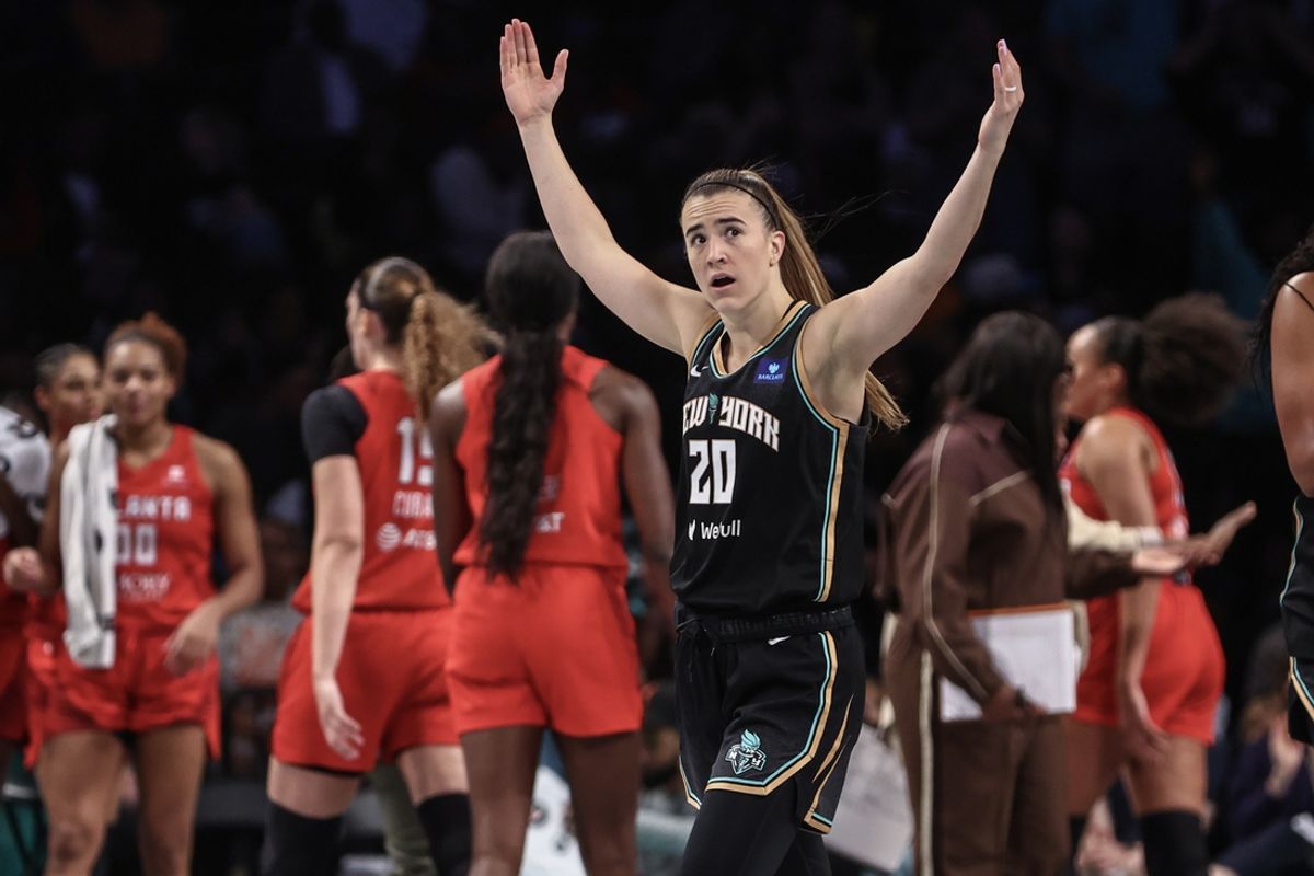 Sep 22, 2024; Brooklyn, New York, USA; New York Liberty guard Sabrina Ionescu (20) celebrates during a timeout against the Atlanta Dream during game one of the first round of the 2024 WNBA Playoffs at Barclays Center. Mandatory Credit: Wendell Cruz-Imagn Images
