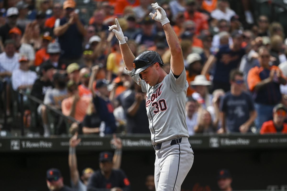 Sep 22, 2024; Baltimore, Maryland, USA;  Detroit Tigers outfielder Kerry Carpenter (30) celebrates at home plate after hitting a sixth inning solo home run against the Baltimore Orioles at Oriole Park at Camden Yards. Mandatory Credit: Tommy Gilligan-Imagn Images