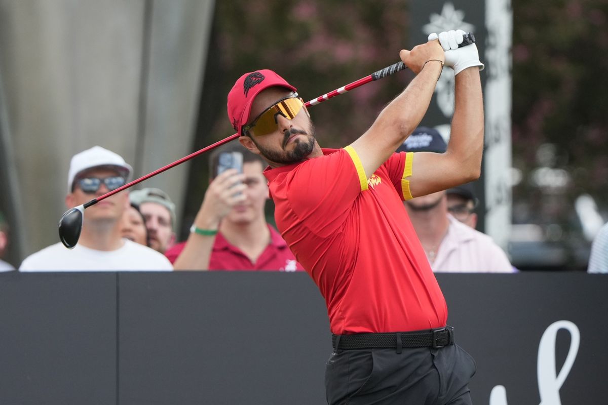 Sep 22, 2024; Carrolton, Texas, USA; Abraham Ancer plays his shot from the 10th tee during the LIV Golf Dallas Team Championship Finals at Maridoe Golf Club. Mandatory Credit: Jim Cowsert-Imagn Images