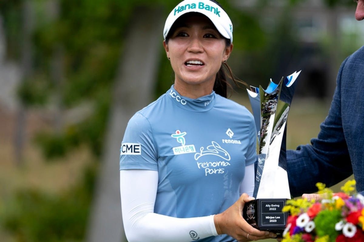 Lydia Ko, of New Zealand, holds the Kroger Queen City Championship trophy after winning the tournament in Cincinnati on Sunday, Sept. 22, 2024.