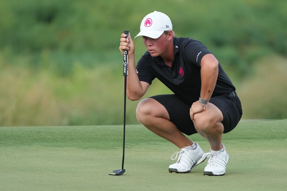 Sep 22, 2024; Carrolton, Texas, USA; Caleb Surratt of Legion XIII lines up a putt on the 18th green during the LIV Golf Dallas Team Championship Finals at Maridoe Golf Club. Mandatory Credit: Jim Cowsert-Imagn Images