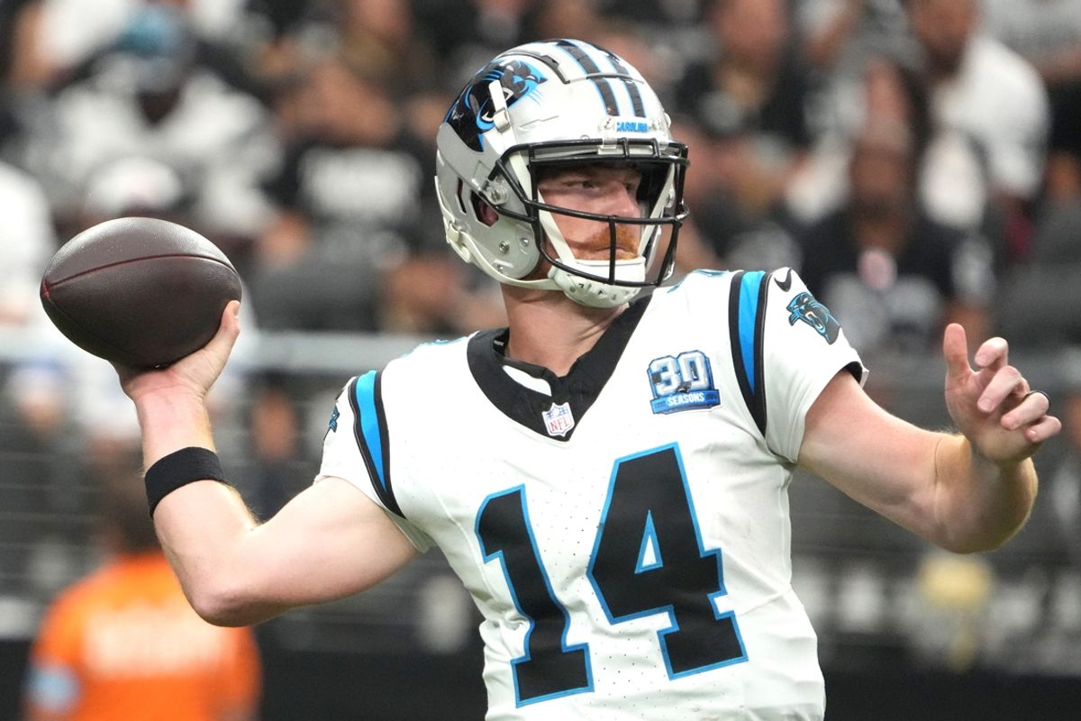 Sep 22, 2024; Paradise, Nevada, USA; Carolina Panthers quarterback Andy Dalton (14) throws the ball against the Las Vegas Raiders in the first half at Allegiant Stadium. Mandatory Credit: Kirby Lee-Imagn Images