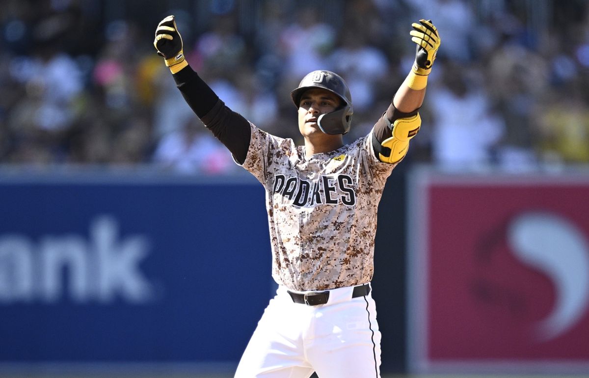 Sep 22, 2024; San Diego, California, USA; San Diego Padres first baseman Donovan Solano (39) celebrates after hitting a double against the Chicago White Sox during the eighth inning at Petco Park. Mandatory Credit: Orlando Ramirez-Imagn Images