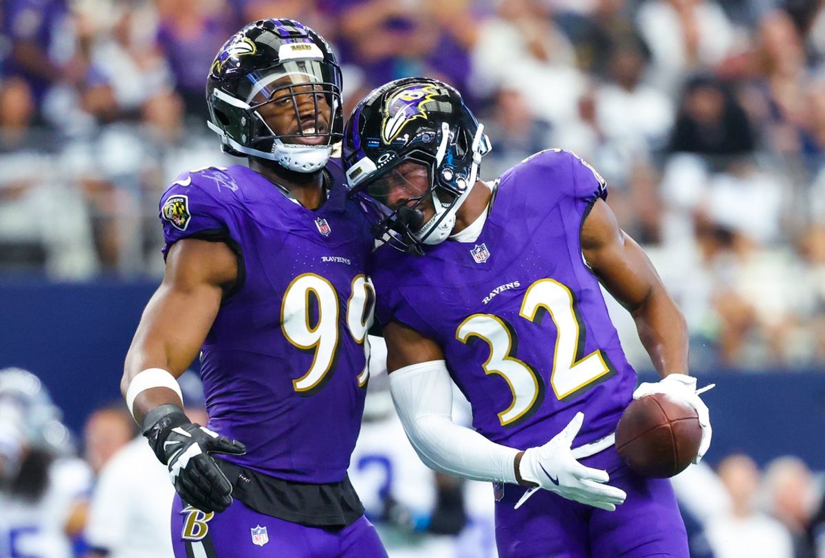 Sep 22, 2024; Arlington, Texas, USA;  Baltimore Ravens safety Marcus Williams (32) celebrates with Baltimore Ravens linebacker Odafe Oweh (99) after recovering a fumble during the first half at AT&T Stadium. Mandatory Credit: Kevin Jairaj-Imagn Images