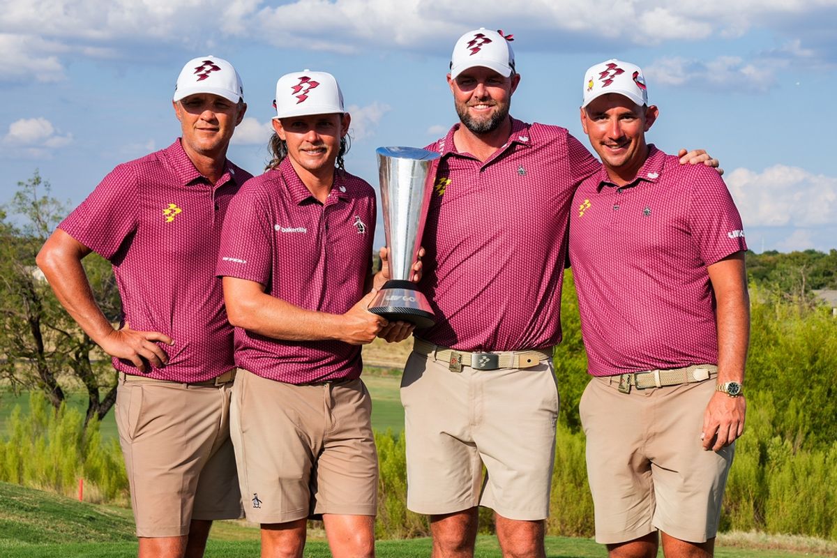 Sep 22, 2024; Carrolton, Texas, USA; Matt Jones, Cameron Smith, Marc Leishman and Lucas Herbert of the Ripper GC pose with the winner’s trophy following the LIV Golf Dallas Team Championship Finals at Maridoe Golf Club. Mandatory Credit: Jim Cowsert-Imagn Images
