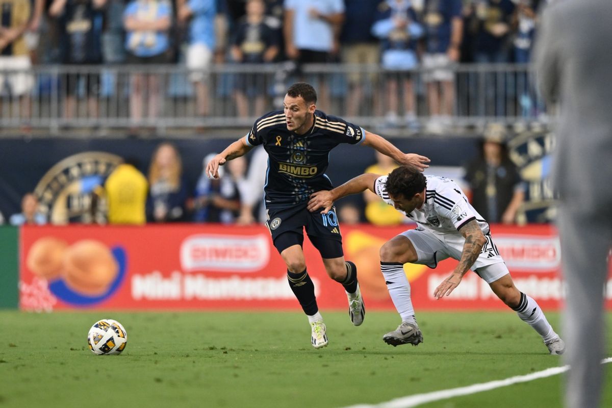 Sep 22, 2024; Philadelphia, Pennsylvania, USA; Philadelphia Union midfielder Daniel Gazdag (10) plays the ball defended day D.C. United defender Aaron Herrera (22) in the first half at Subaru Park. Mandatory Credit: Kyle Ross-Imagn Images