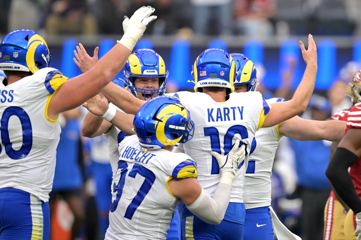 Sep 22, 2024; Inglewood, California, USA;  Los Angeles Rams place kicker Joshua Karty (16) is congratulated after scoring the game winning field goal in the fourth quarter against the San Francisco 49ers at SoFi Stadium. Mandatory Credit: Jayne Kamin-Oncea-Imagn Images