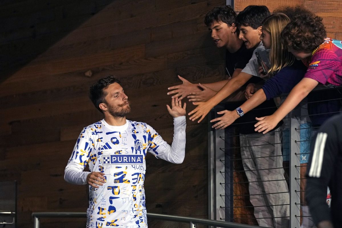 Sep 21, 2024; San Jose, California, USA; St. Louis CITY SC midfielder Indiana Vassilev (19) greets fans before the game against the San Jose Earthquakes at PayPal Park. Mandatory Credit: Darren Yamashita-Imagn Images