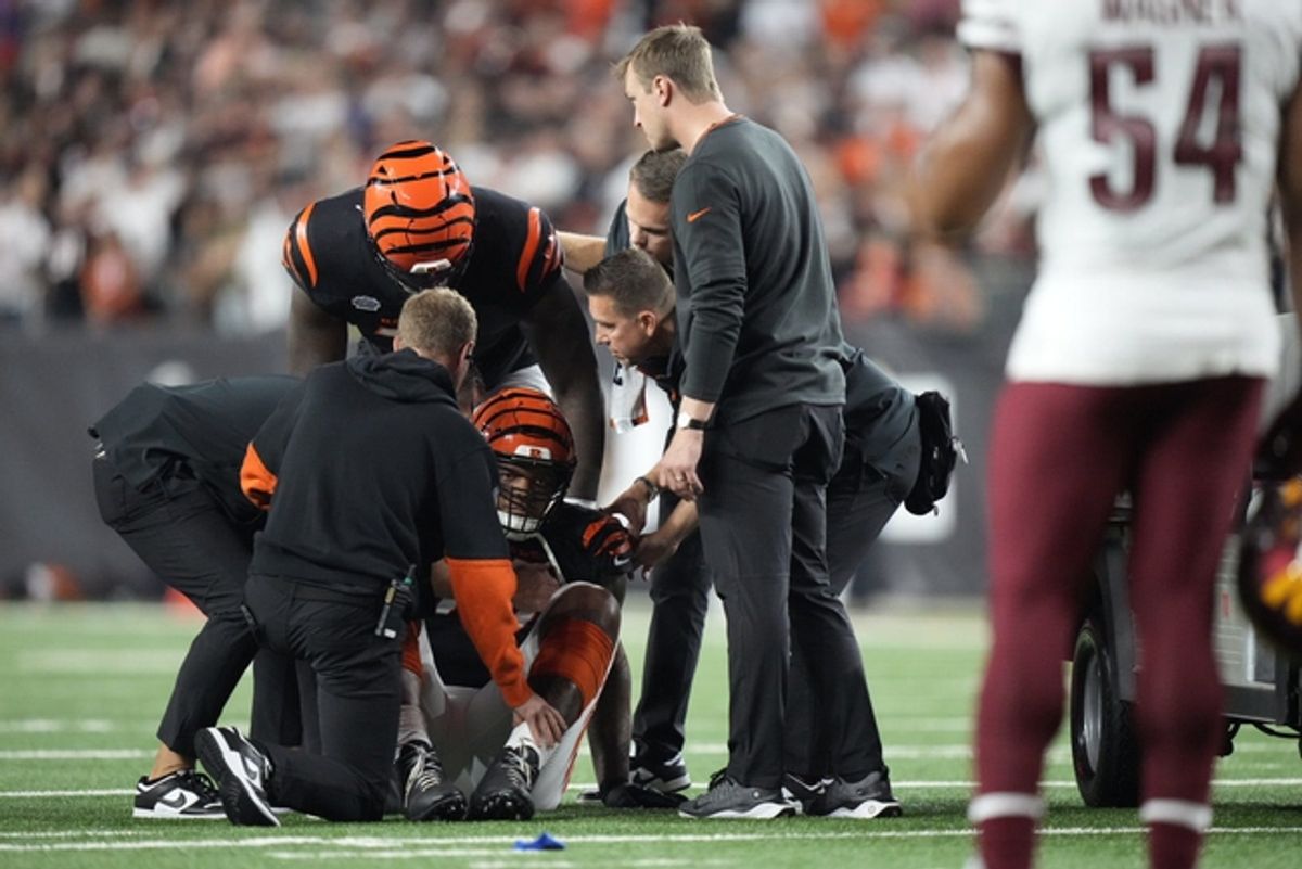 Cincinnati Bengals offensive lineman Trent Brown is attended to against the Washington Commanders on Sept. 23, 2024.