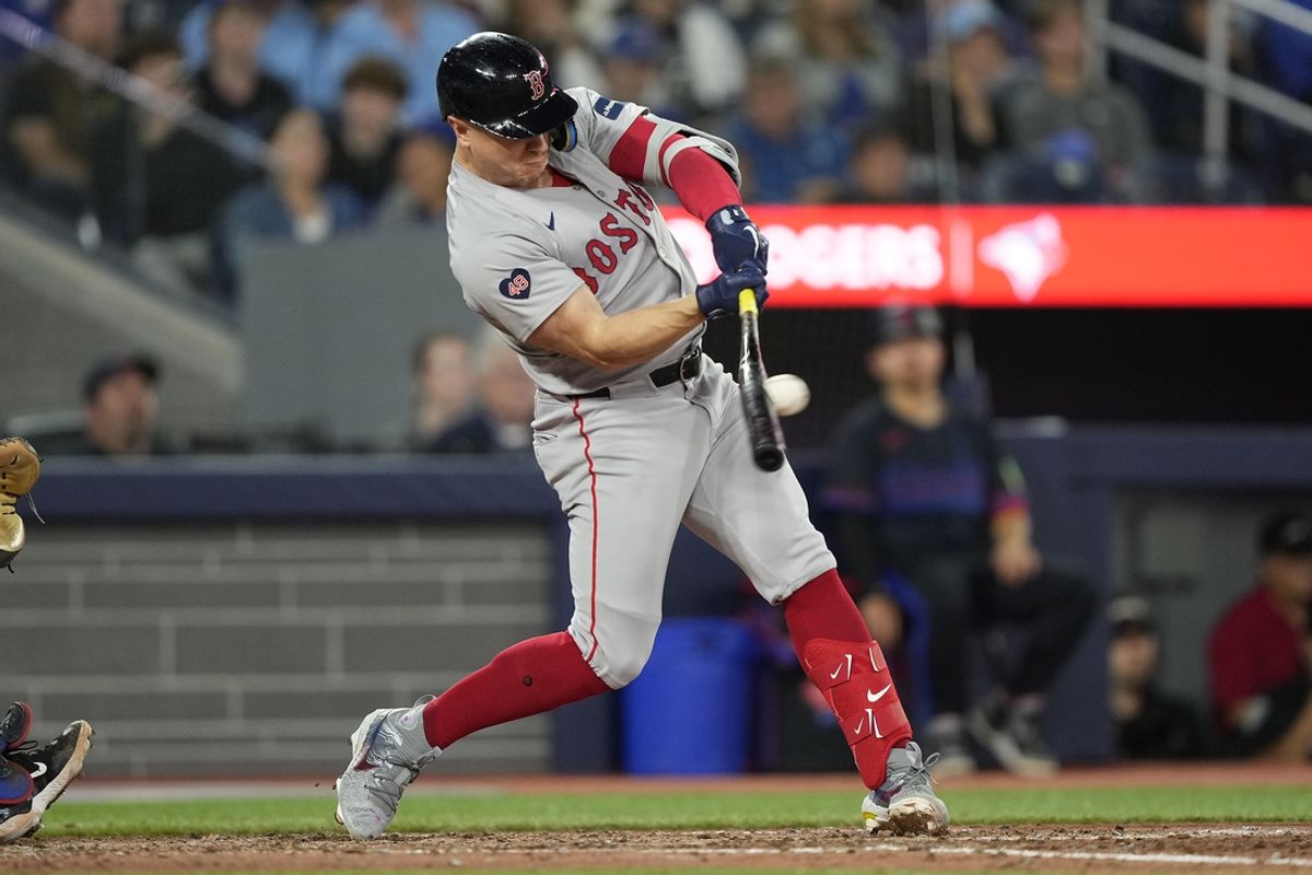 Sep 23, 2024; Toronto, Ontario, CAN; Boston Red Sox designated hitter Tyler O'Neill (17) makes contact with the ball during the seventh inning against the Toronto Blue Jays at Rogers Centre. Mandatory Credit: John E. Sokolowski-Imagn Images