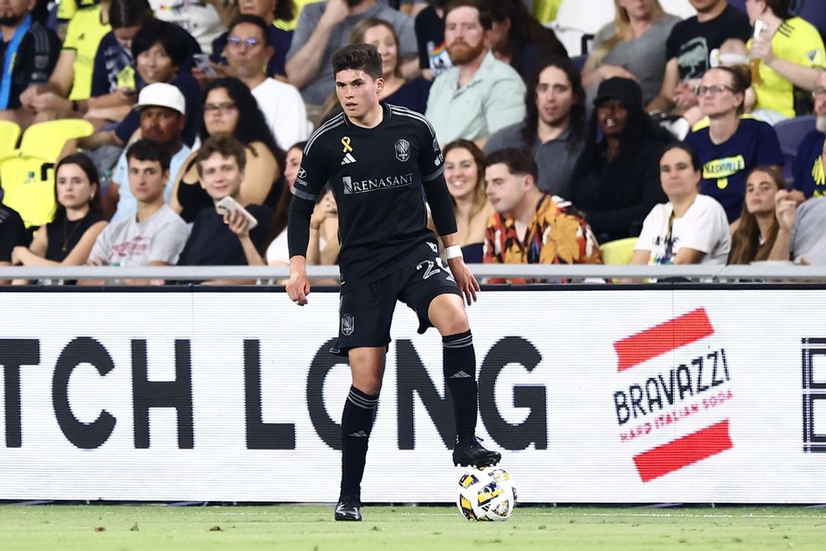Sep 21, 2024; Nashville, Tennessee, USA; Nashville SC midfielder Jonathan Perez (24) stops a ball from going out of bounds in the first half of the match against FC Cincinnati at Geodis Park. Mandatory Credit: Casey Gower-Imagn Images