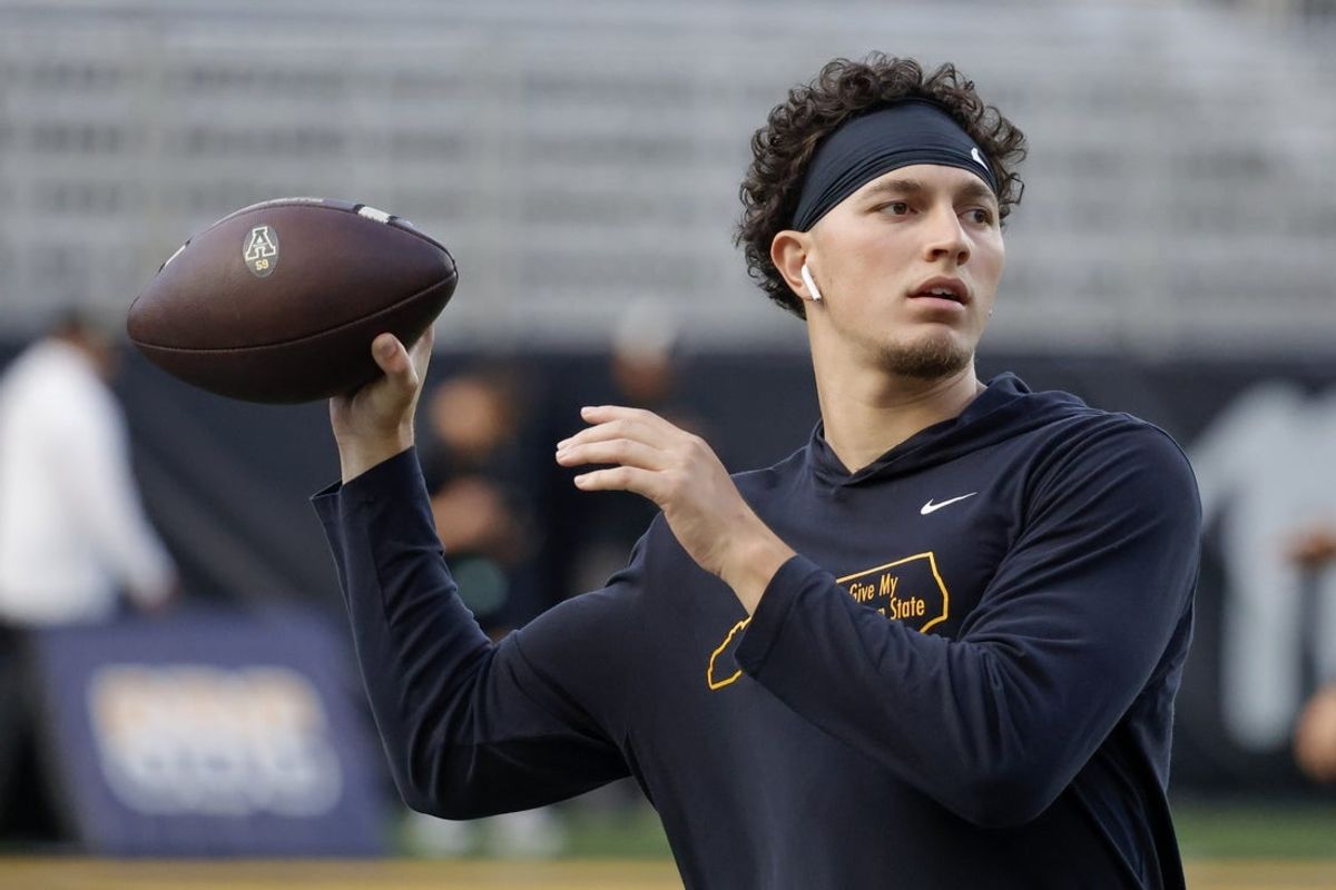 Sep 19, 2024; Boone, North Carolina, USA;  Appalachian State Mountaineers quarterback Joey Aguilar (4) throws a warmup pass before the game against the South Alabama Jaguars at Kidd Brewer Stadium. Mandatory Credit: Reinhold Matay-Imagn Images