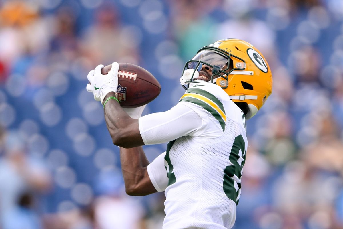 Sep 22, 2024; Nashville, Tennessee, USA;  Green Bay Packers wide receiver Romeo Doubs (87) makes a catch against the Tennessee Titans during pregame warmups at Nissan Stadium. Mandatory Credit: Steve Roberts-Imagn Images