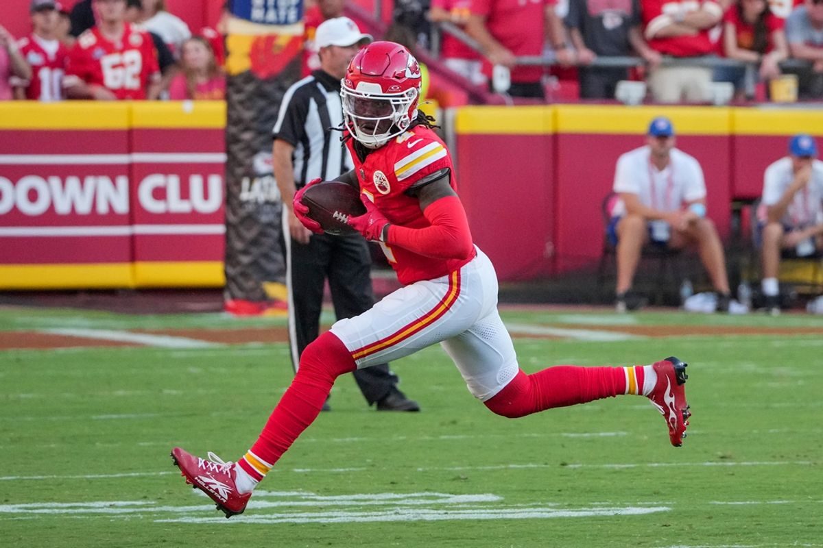 Sep 15, 2024; Kansas City, Missouri, USA; Kansas City Chiefs wide receiver Rashee Rice (4) catches a pass against the Cincinnati Bengals during the game at GEHA Field at Arrowhead Stadium. Mandatory Credit: Denny Medley-Imagn Images