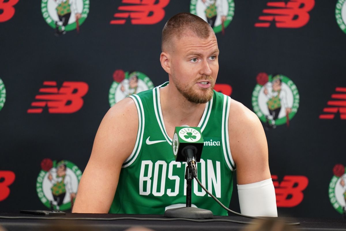 Sep 24, 2024; Boston, MA, USA; Boston Celtics center Kristaps Porzingis (8) talks to reporters during media day at Auerbach Center. Mandatory Credit: David Butler II-Imagn Images