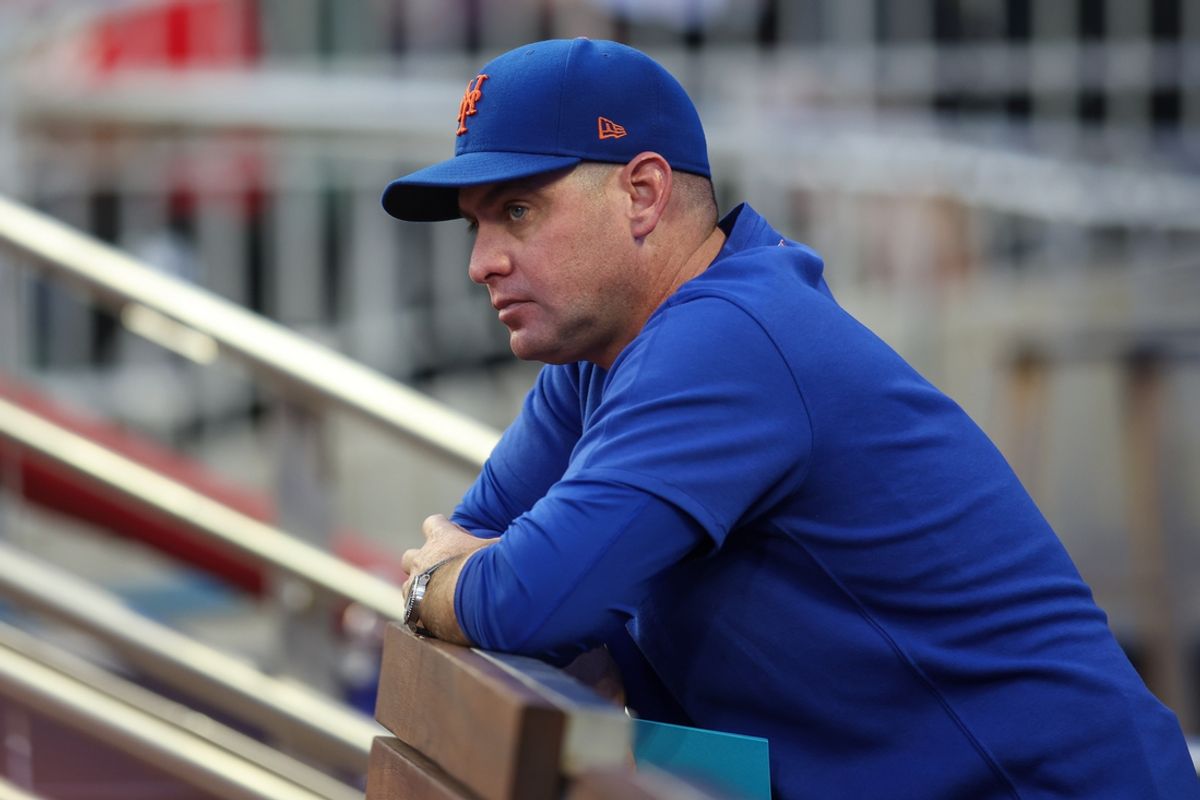 Sep 24, 2024; Atlanta, Georgia, USA; New York Mets manager Carlos Mendoza (64) in the dugout before a game against the Atlanta Braves at Truist Park. Mandatory Credit: Brett Davis-Imagn Images