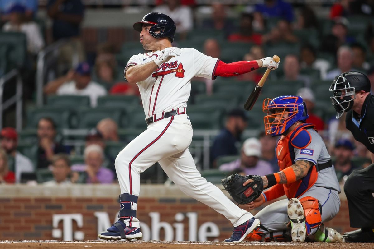 Sep 24, 2024; Atlanta, Georgia, USA; Atlanta Braves left fielder Ramon Laureano (18) hits an RBI single against the New York Mets in the third inning at Truist Park. Mandatory Credit: Brett Davis-Imagn Images
