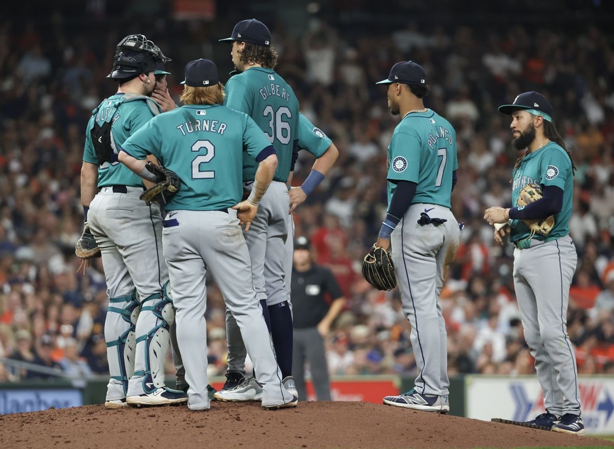 Sep 24, 2024; Houston, Texas, USA; Seattle Mariners starting pitcher Logan Gilbert (36) gets a pitchers mound visit after the Houston Astro load two men on base in the sixth inning at Minute Maid Park. Mandatory Credit: Thomas Shea-Imagn Images