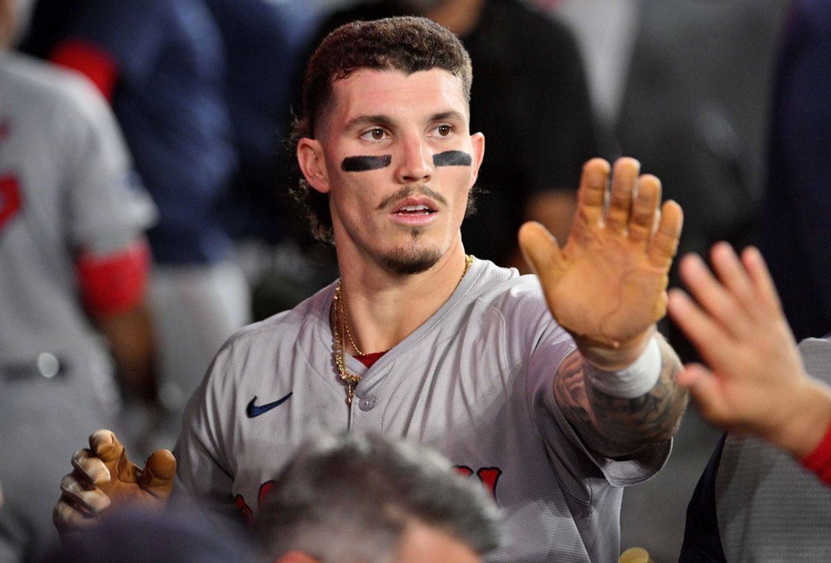 Sep 24, 2024; Toronto, Ontario, CAN; Boston Red Sox left fielder Jarren Duran (16) celebrates with teammates in the dugout after scoring a run against the Toronto Blue Jays in the tenth inning at Rogers Centre. Mandatory Credit: Dan Hamilton-Imagn Images