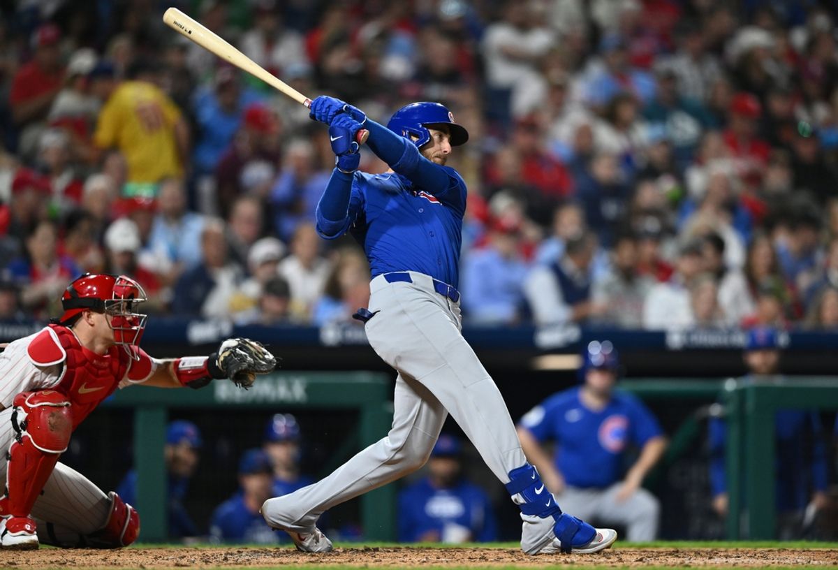 Sep 25, 2024; Philadelphia, Pennsylvania, USA; Chicago Cubs infielder Cody Bellinger (24) hits an RBI single against the Philadelphia Phillies in the fifth inning at Citizens Bank Park. Mandatory Credit: Kyle Ross-Imagn Images