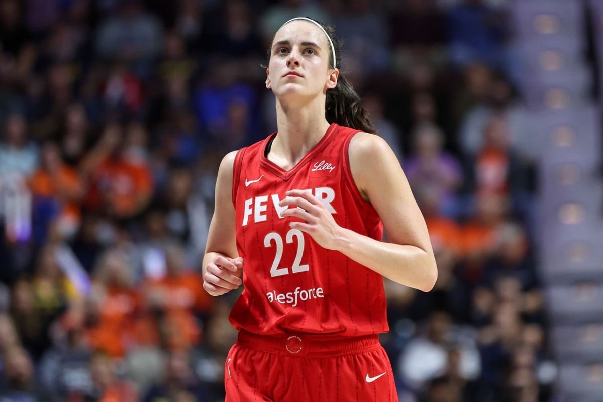 Sep 25, 2024; Uncasville, Connecticut, USA; Indiana Fever guard Caitlin Clark (22) reacts during the first half against the Connecticut Sun during game two of the first round of the 2024 WNBA Playoffs at Mohegan Sun Arena. Mandatory Credit: Paul Rutherford-Imagn Images