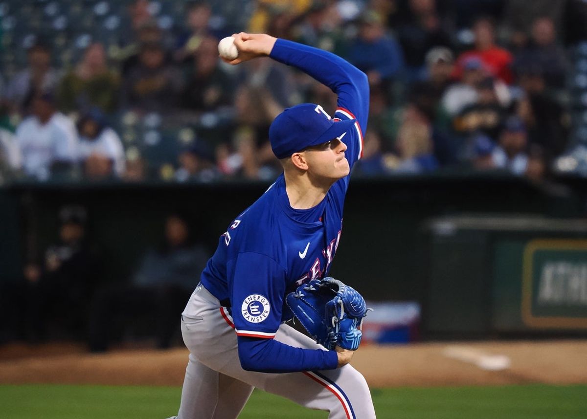Sep 25, 2024; Oakland, California, USA; Texas Rangers starting pitcher Cody Bradford (61) pitches the ball against the Oakland Athletics during the first inning at Oakland-Alameda County Coliseum. Mandatory Credit: Kelley L Cox-Imagn Images
