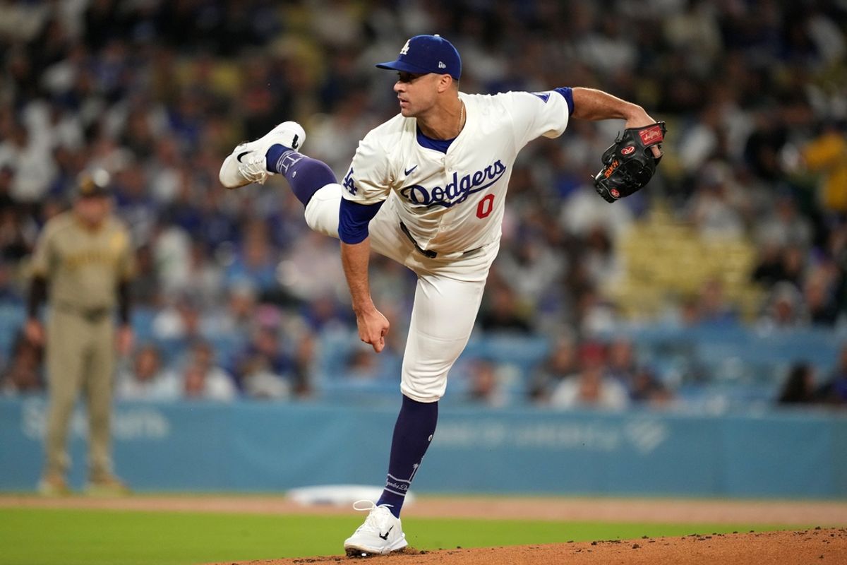 Sep 25, 2024; Los Angeles, California, USA;  Los Angeles Dodgers starting pitcher Jack Flaherty (0) pitches in the first inning against San Diego Padres at Dodger Stadium. Mandatory Credit: Kirby Lee-Imagn Images