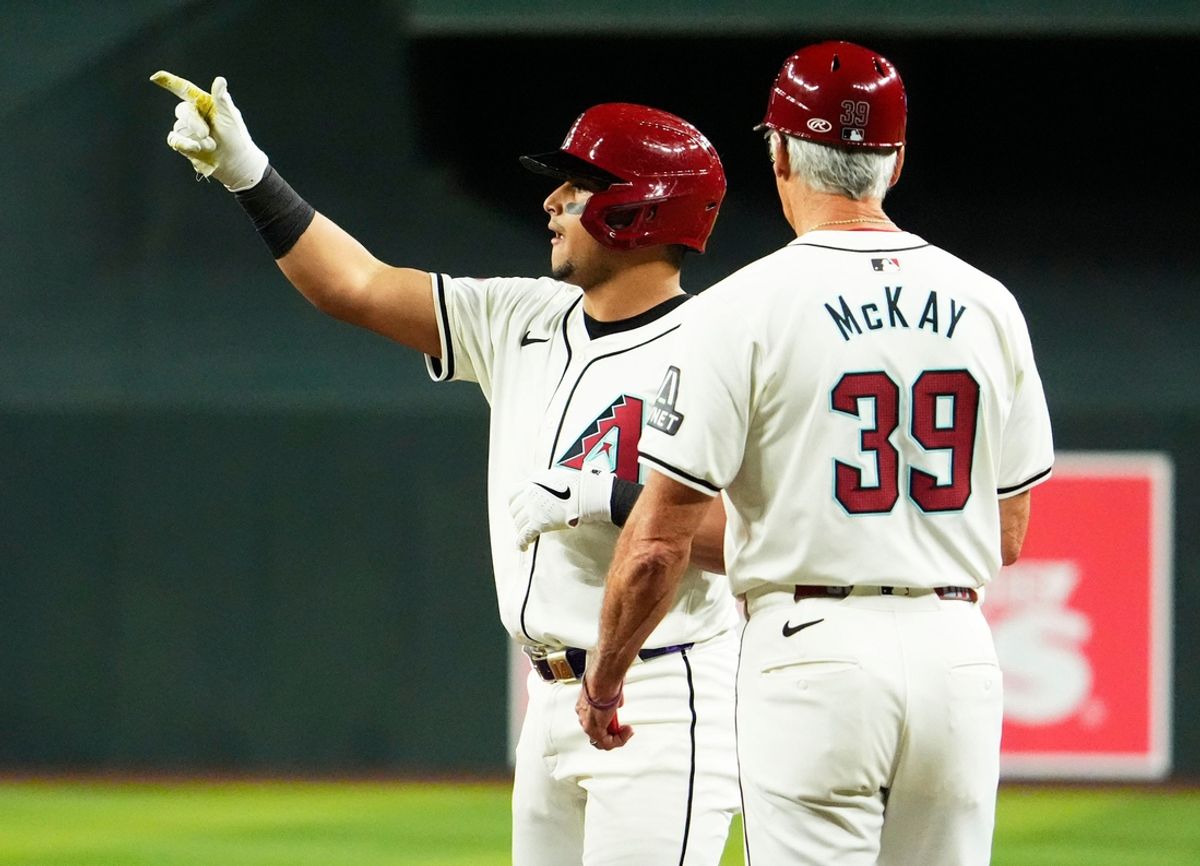 Arizona Diamondbacks Gabriel Moreno (14) reacts after hitting an RBI-single against the San Francisco Giants in the second inning at Chase Field in Phoenix on Sept. 25, 2024.
