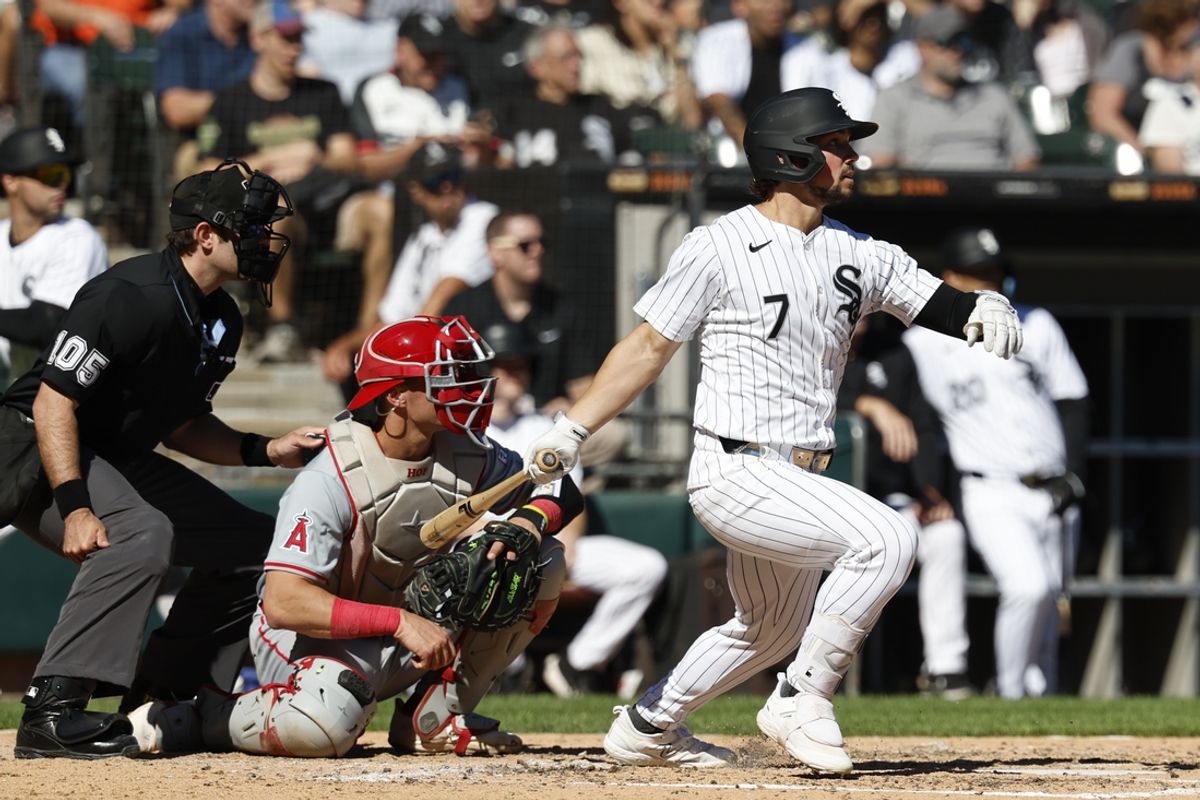 Sep 26, 2024; Chicago, Illinois, USA; Chicago White Sox outfielder Dominic Fletcher (7) hits a single against the Los Angeles Angels during the fifth inning at Guaranteed Rate Field. Mandatory Credit: Kamil Krzaczynski-Imagn Images